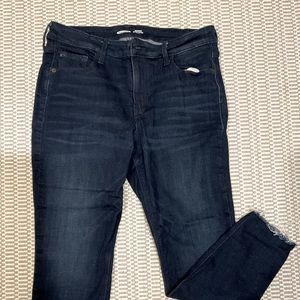 Rockstar Mid-rise Super Skinny Frayed Ankle Dark Wash Jean